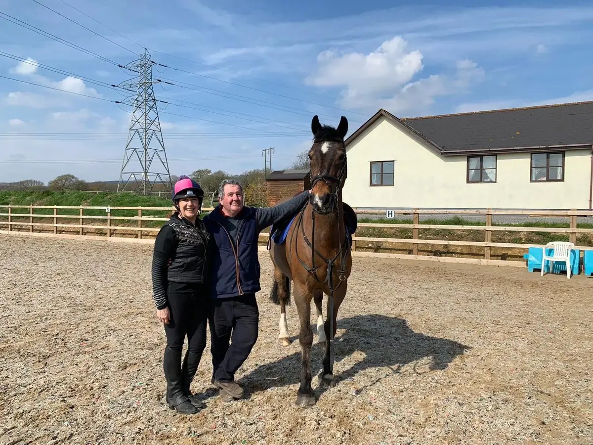 Horse, rider and saddle fitter at Cae Hamdden